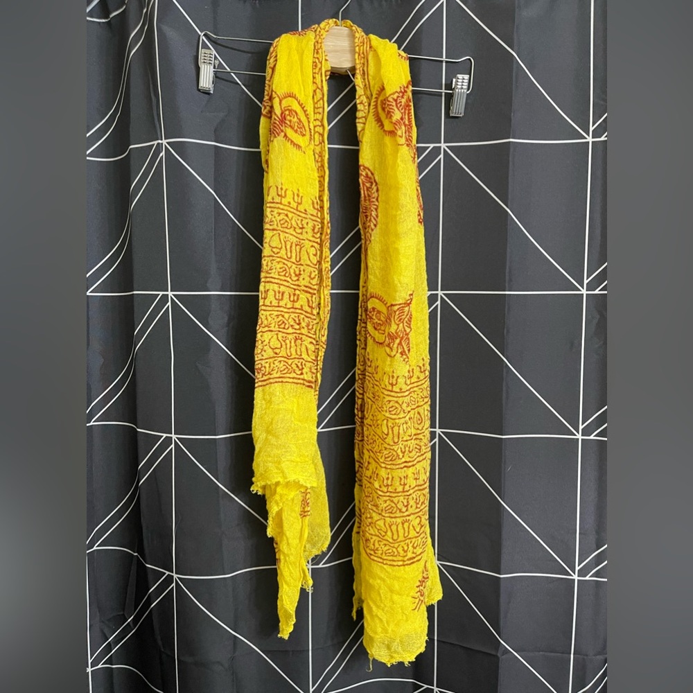 Yellow Buddha scarf. Good condition.